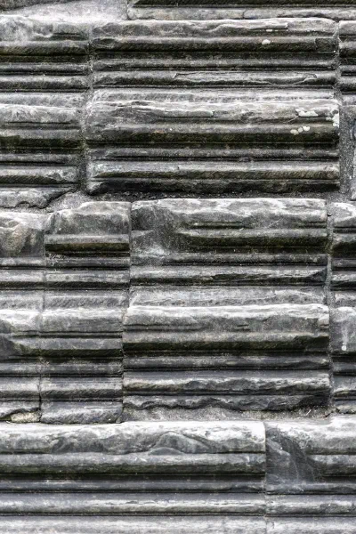 The worn edges and repeating patterns of ancient stone steps.